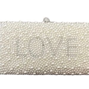 New with tags- Alessia Pearl “ Love “ Clutch. Perfect bridal purse